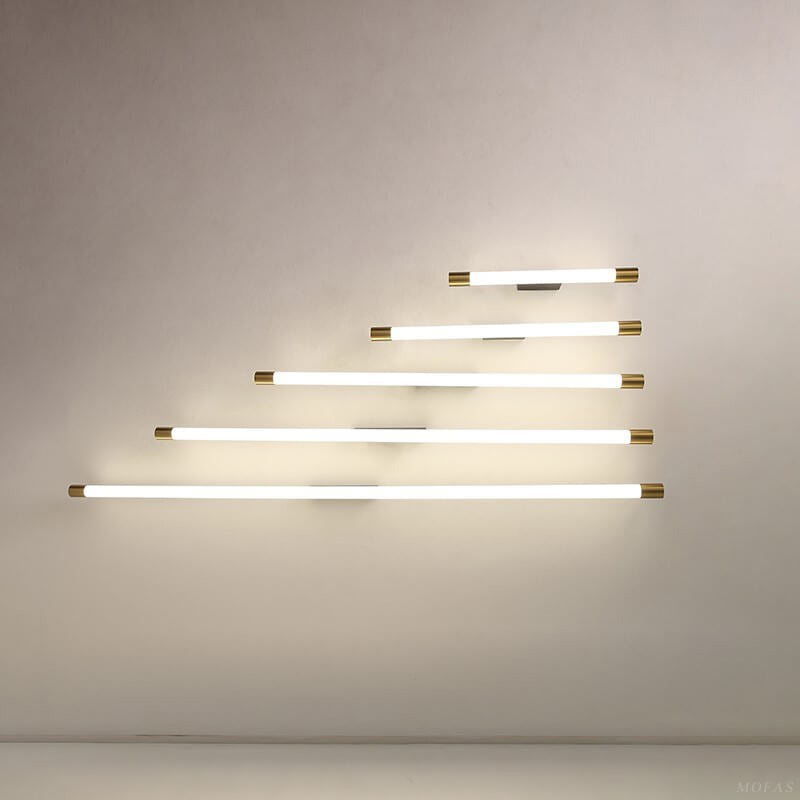 End-on view of the aluminum tube and brass cap of the wall sconce