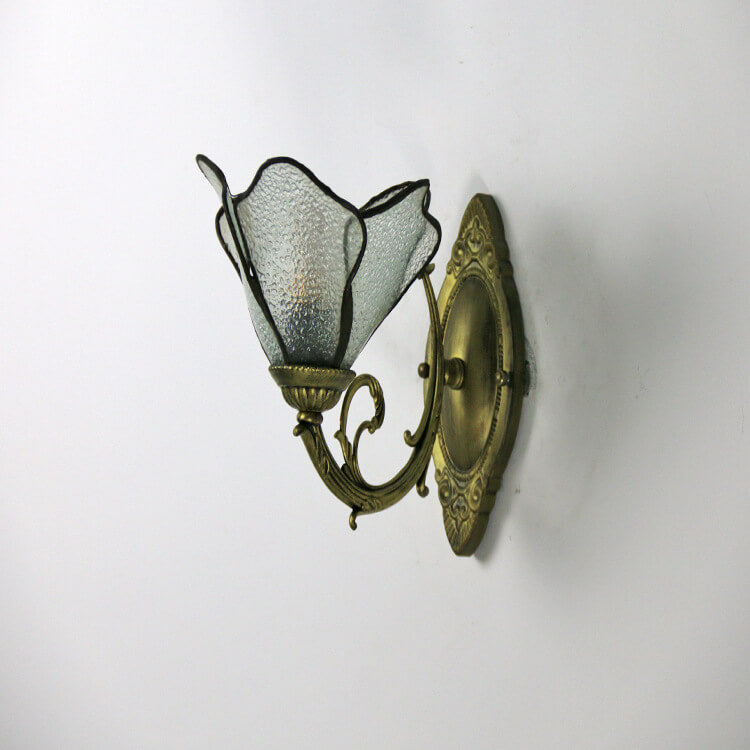 Petal glass wall sconce measured to show its height and width