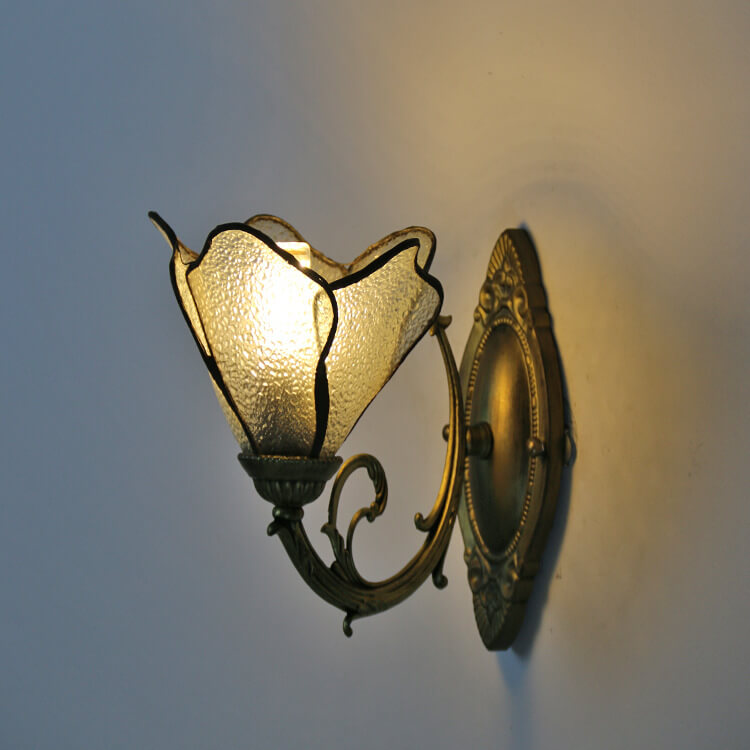 Petal art glass sconce shade viewed from the side angle