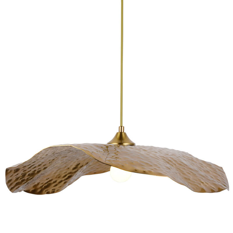 Gold lotus leaf pendant lights arranged over a modern dining table