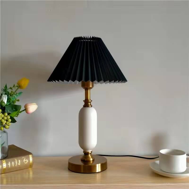 Side profile of the table lamp showing pleated shade and column base