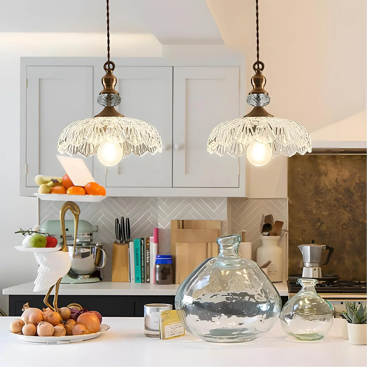 Glass flower pendant light with exposed E26 bulb below the shade rim