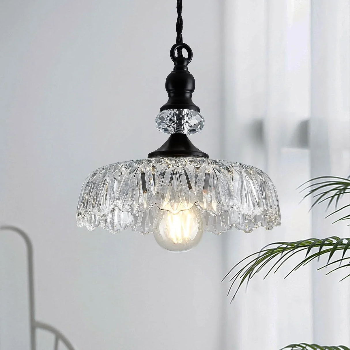 Retro glass flower pendant light seen from above the shade