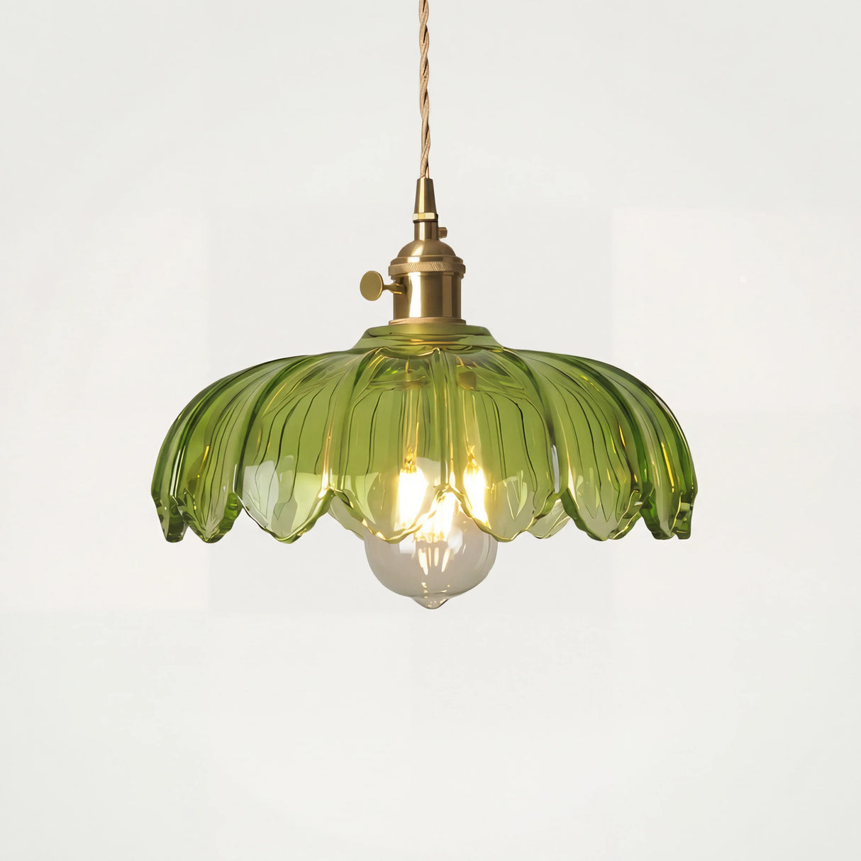 Tulip glass pendant light on a plain studio background