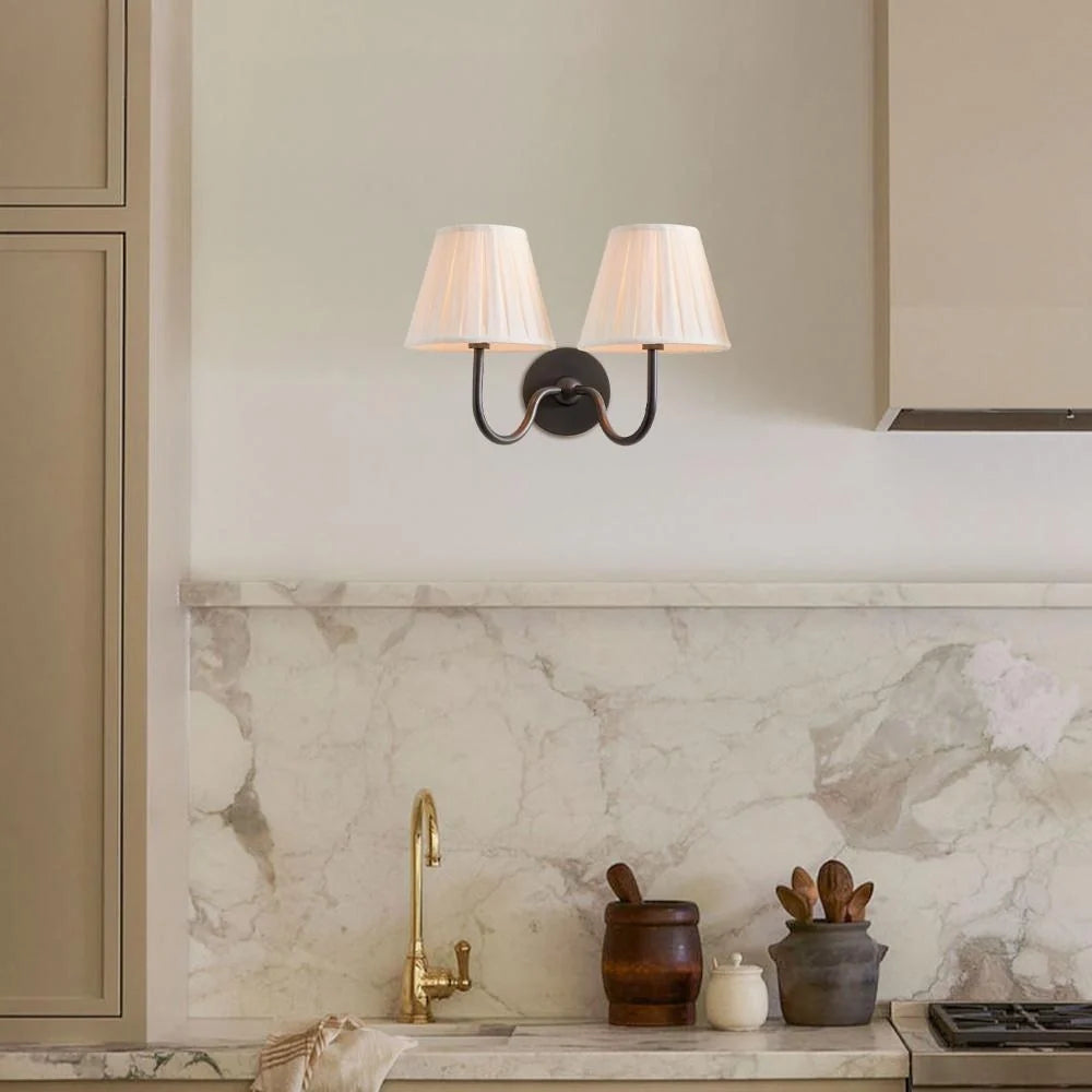 Two-head wall sconce with paired pleated linen shades on a metal frame, mustard yellow shade side view 22