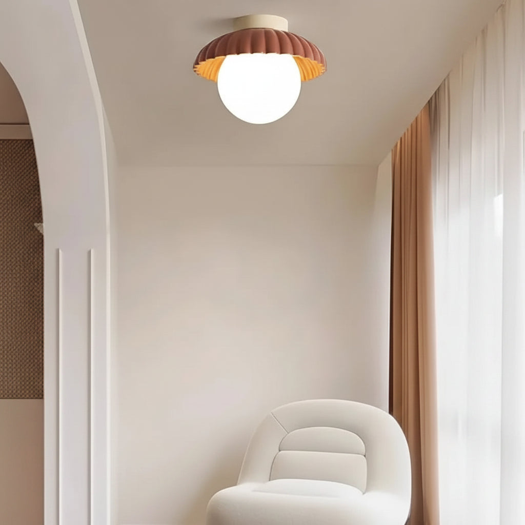 Flower-bud ceiling light showing the two-tone shade and glowing globe