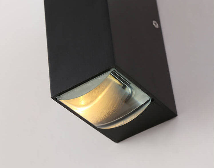 Close-up of the wall sconce light aperture and clear diffuser lens