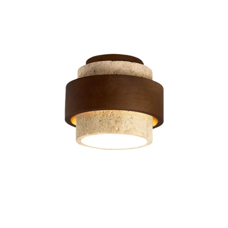 Stone ceiling light showing natural colour variation across the travertine