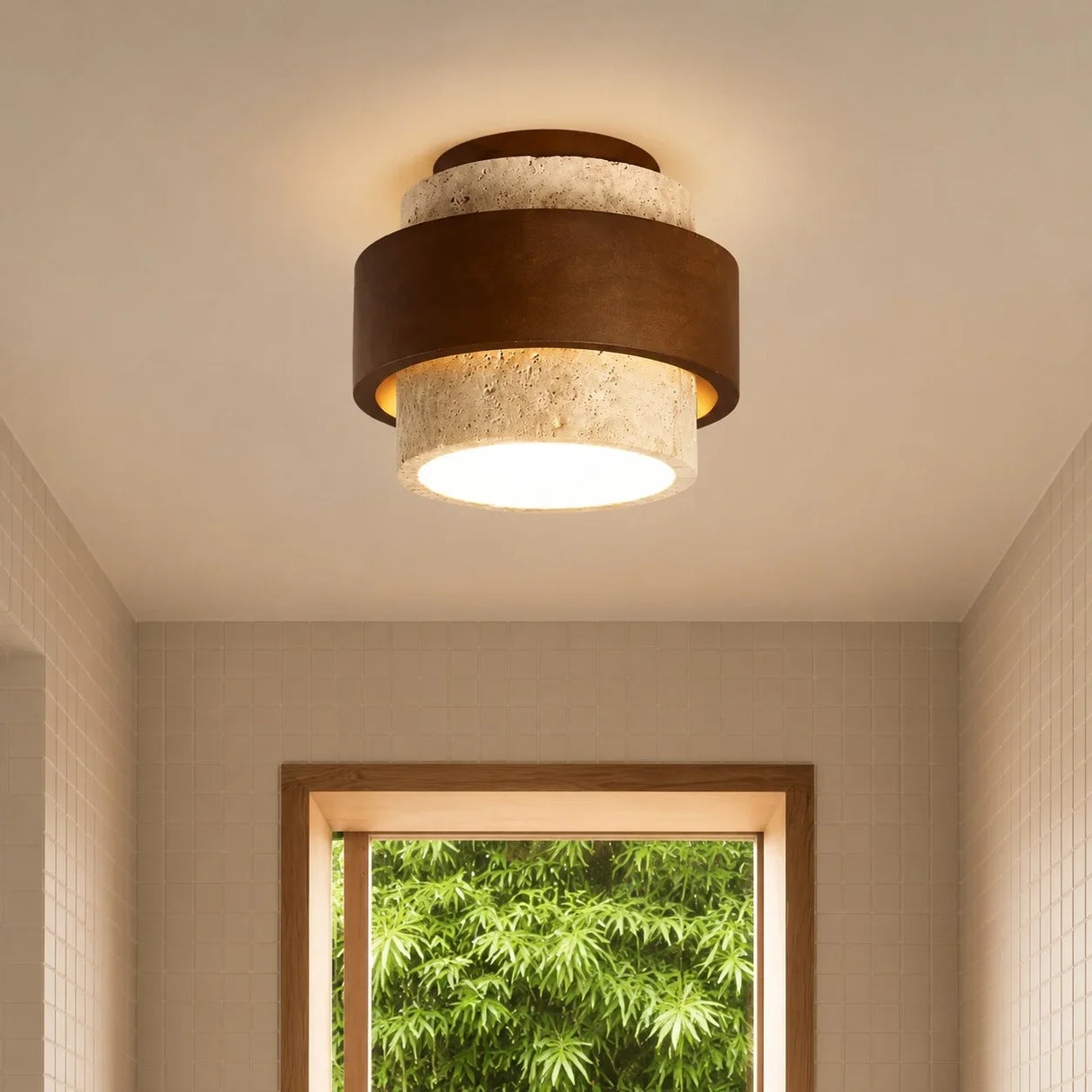 Side profile of tiered travertine and walnut flush mount ceiling fixture