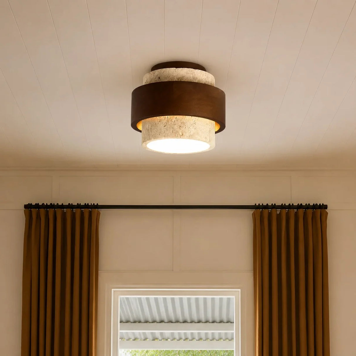 Underside of travertine ceiling light showing the diffused light aperture