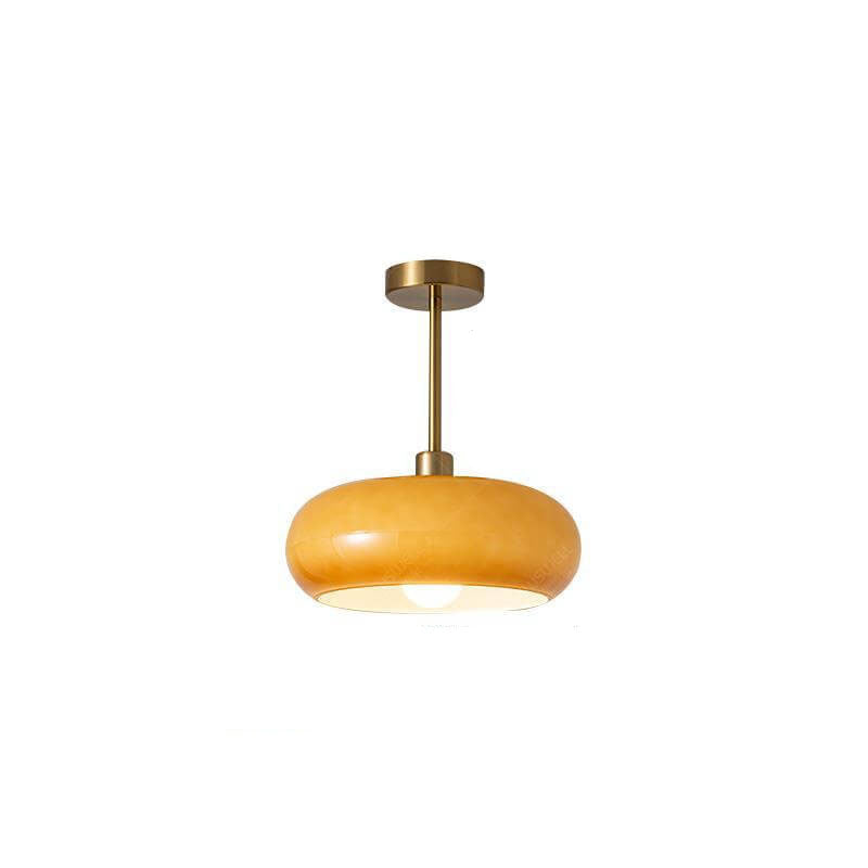 Amber glass flush mount light seen from below the open shade