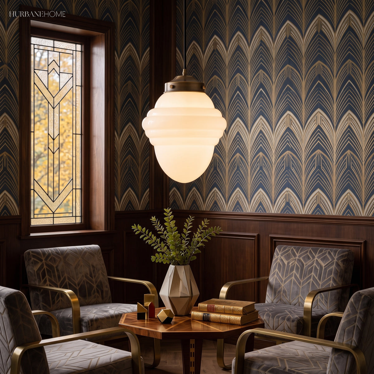 Acorn shaped milk glass pendant above a table between patterned walls