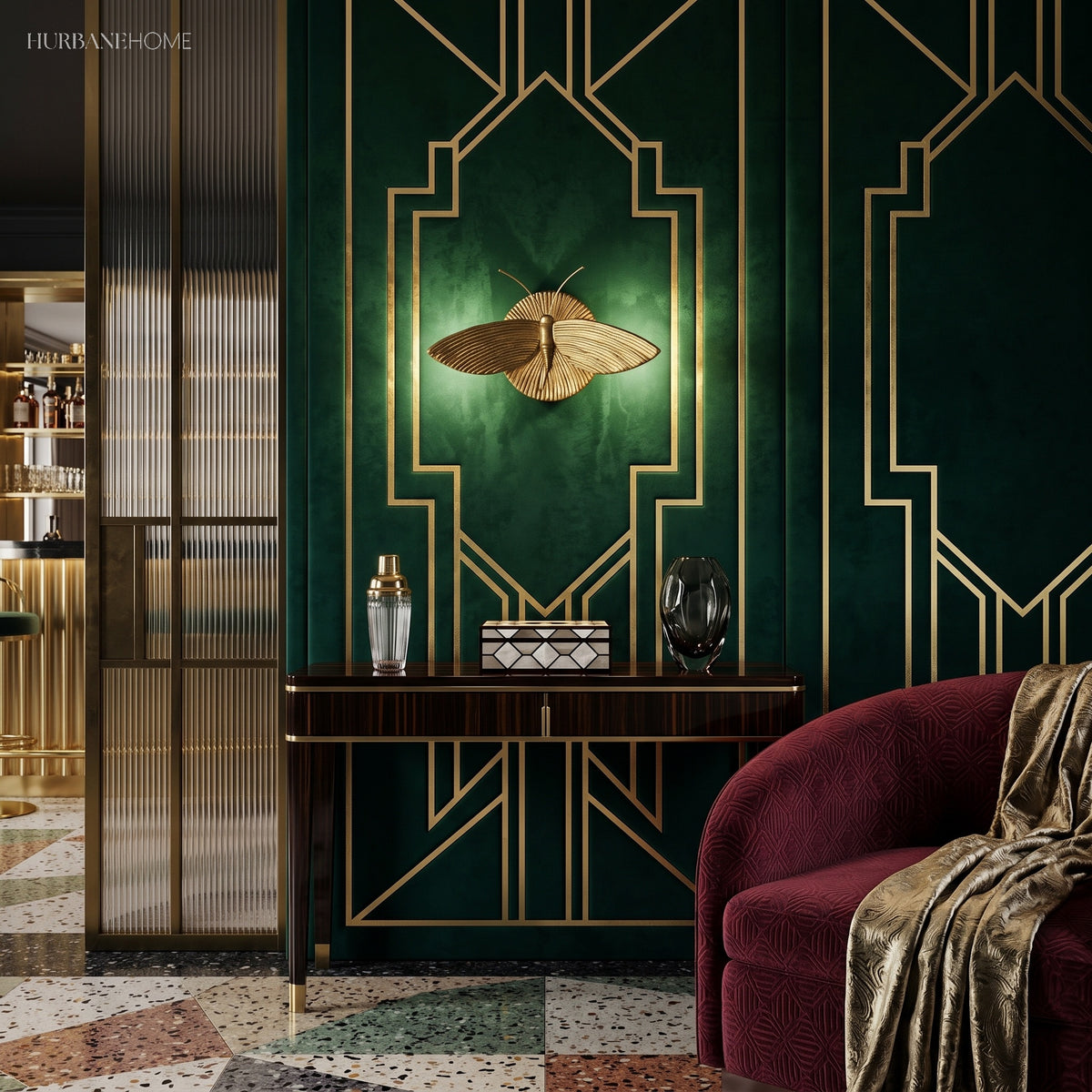 Moth wall sconce on emerald panelling above a slim console and bar