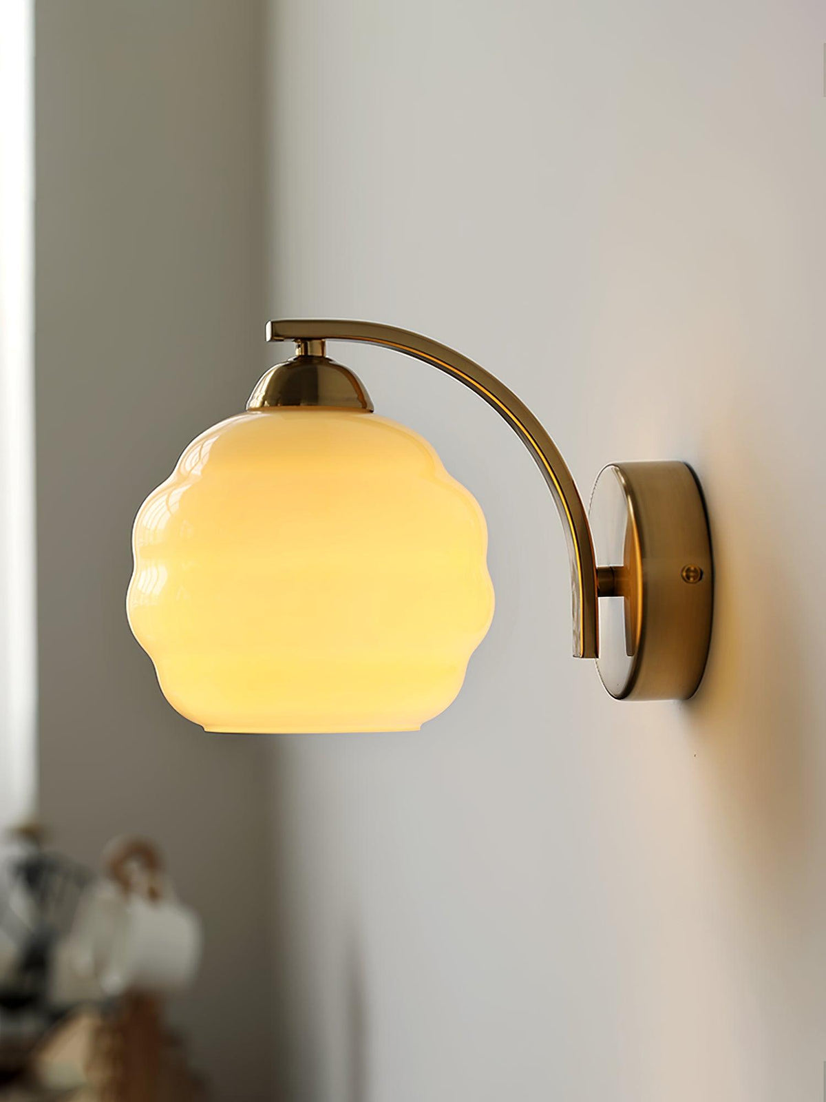 Indoor wall sconce with an iron body and opal glass globe, view 18