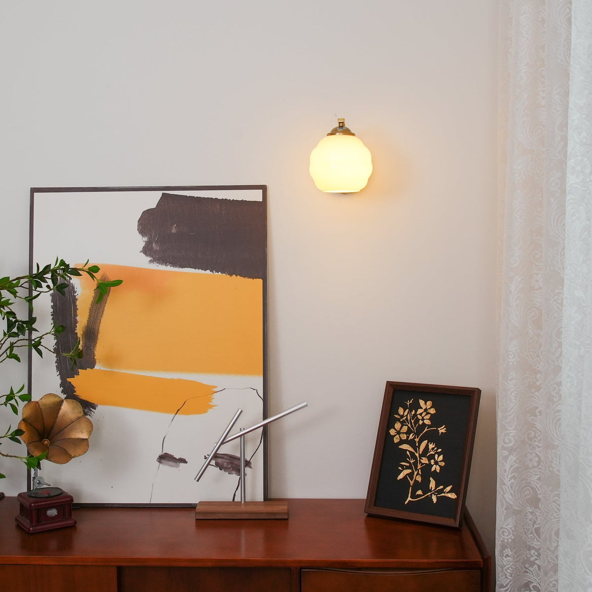 Indoor wall sconce with an iron body and opal glass globe, view 48