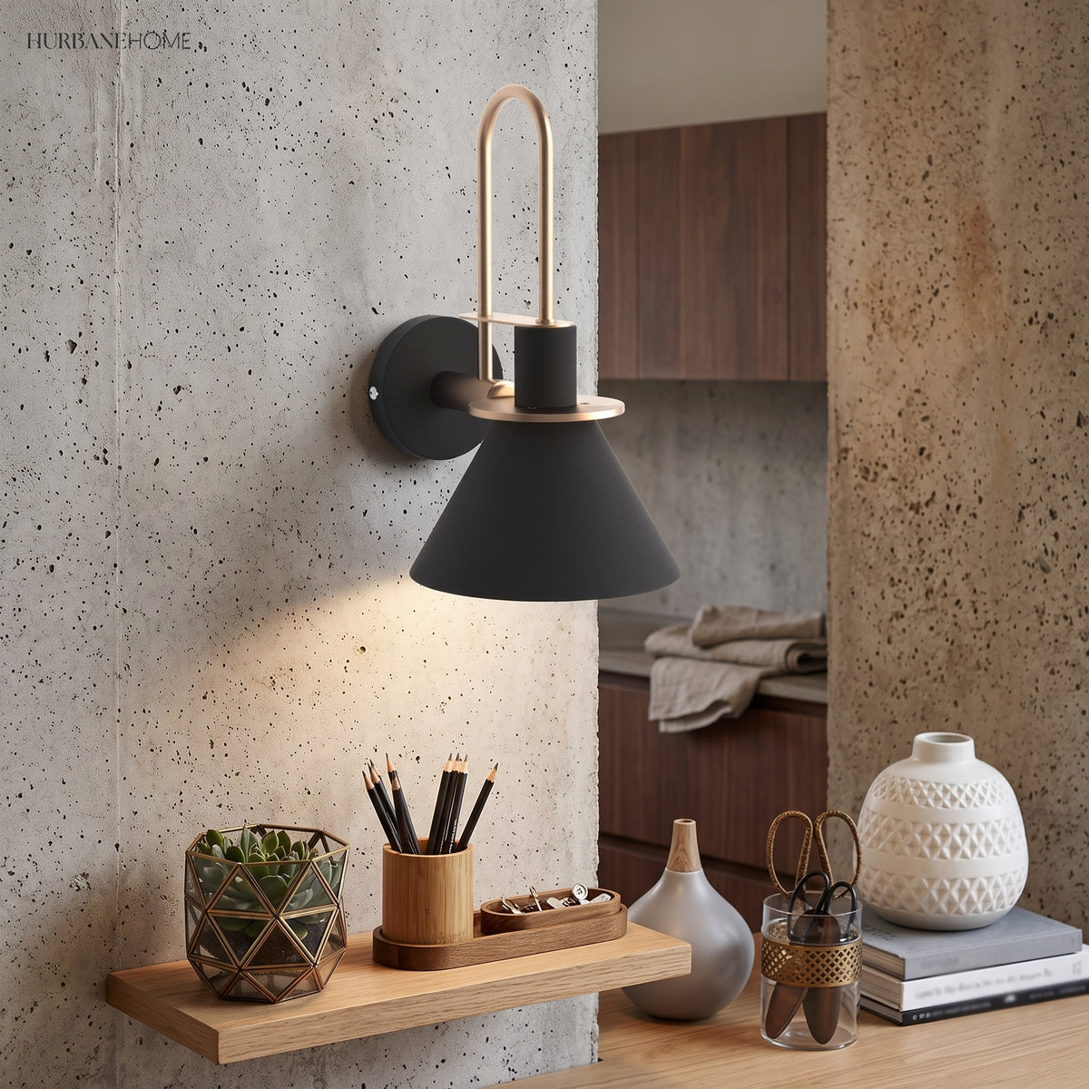 Black cone sconce on a concrete wall above a floating timber shelf