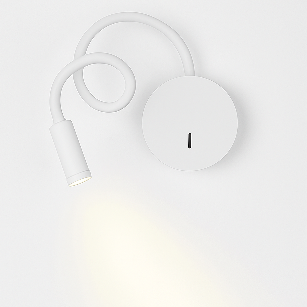 White reading light seen from above with the beam on the wall