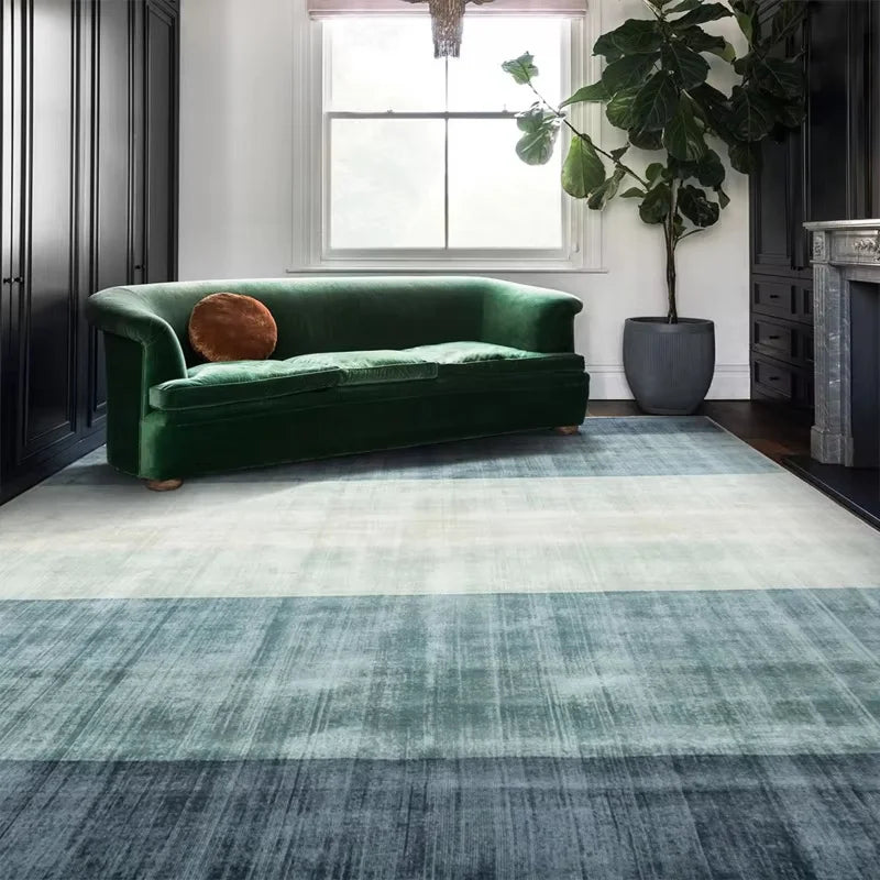 Blue gradient rug creating soft visual flow in living room interior