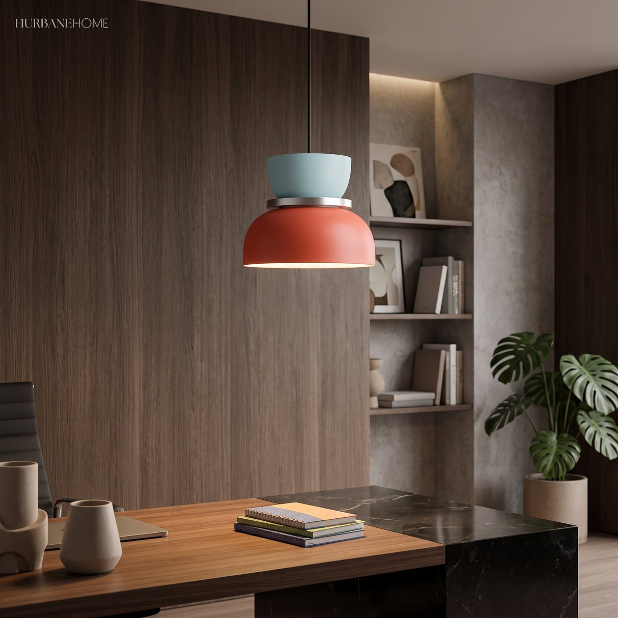 Colourful bowl pendant light hanging in a wood-panelled study room