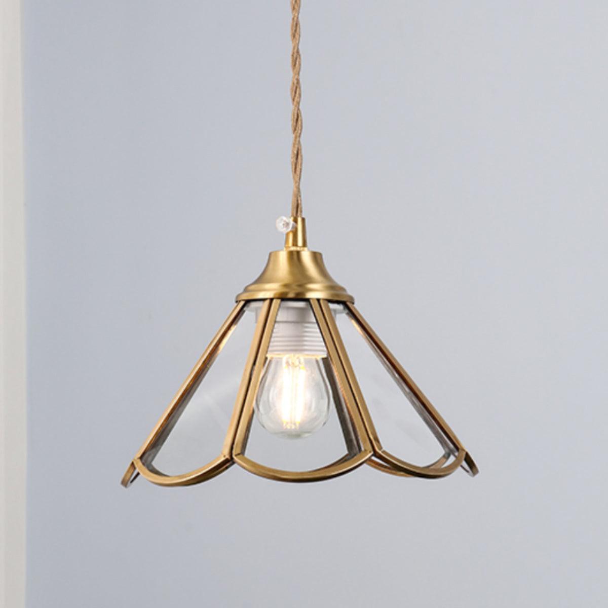 Open brass framed pendant with a clear filament bulb visible inside the frame