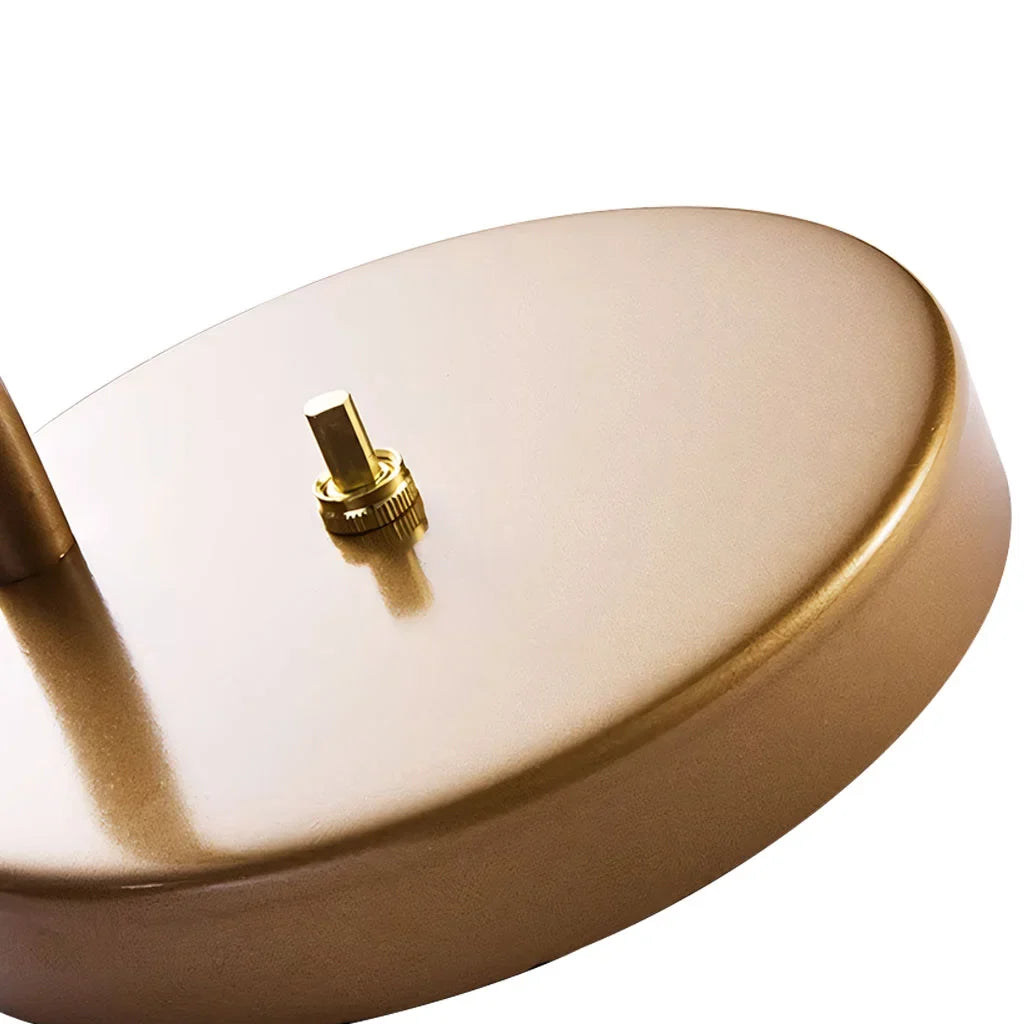 Brass table lamp arm and base close up