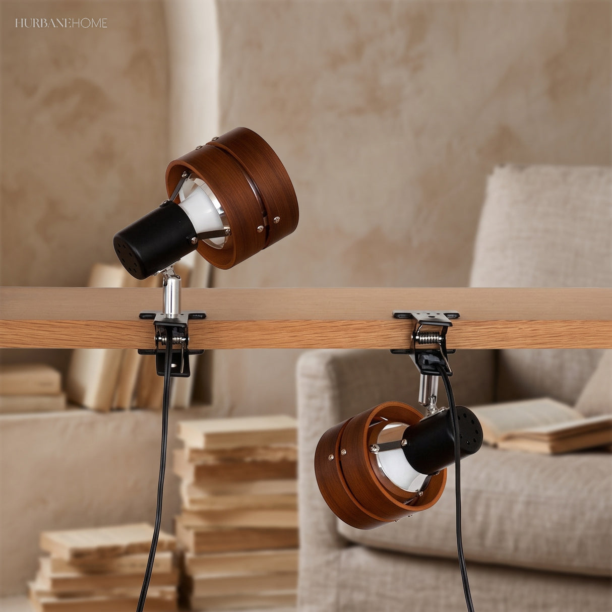 Clip-on spotlight reading lamps on a wooden rail