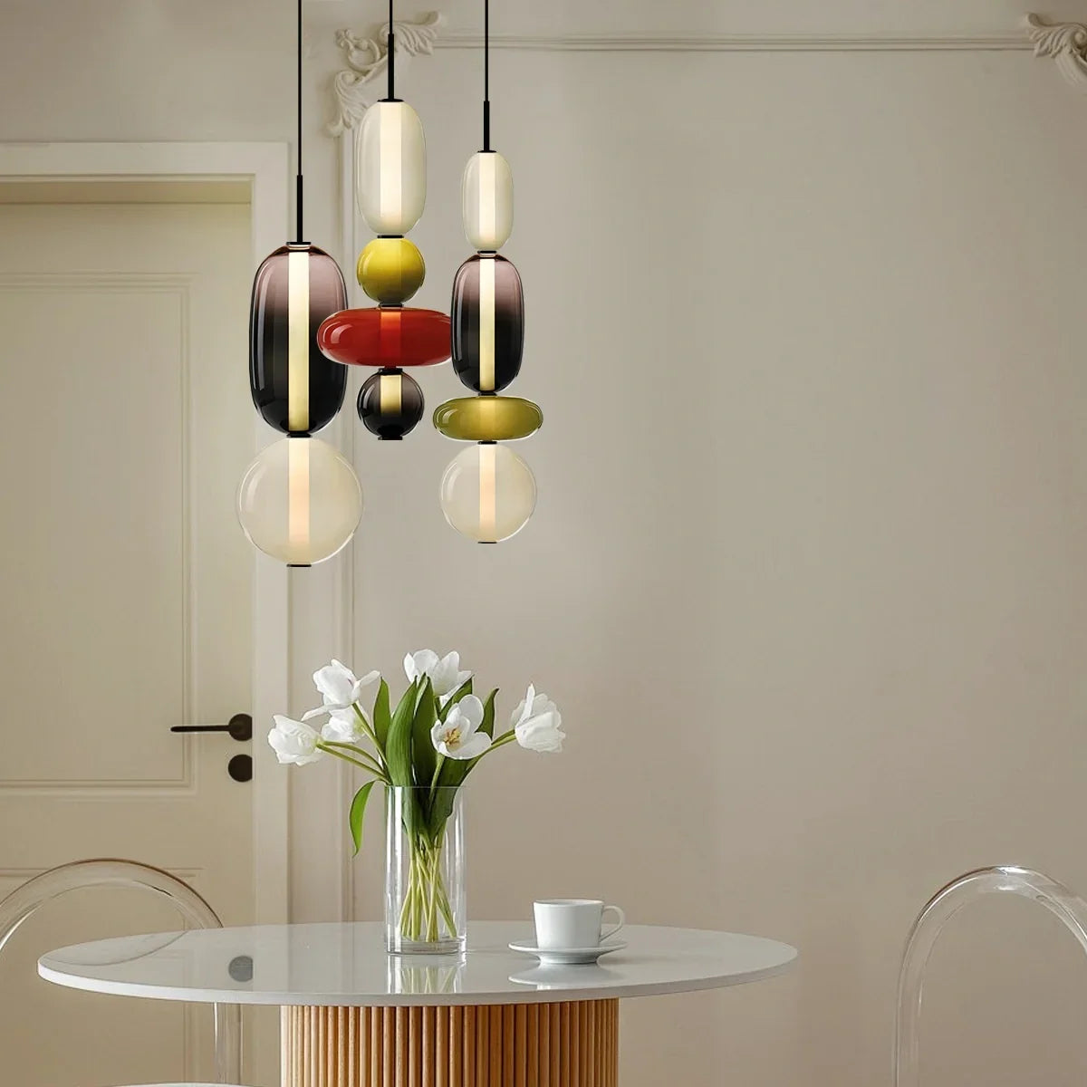 Glass pendant light scene with warm ambient glow in a styled room