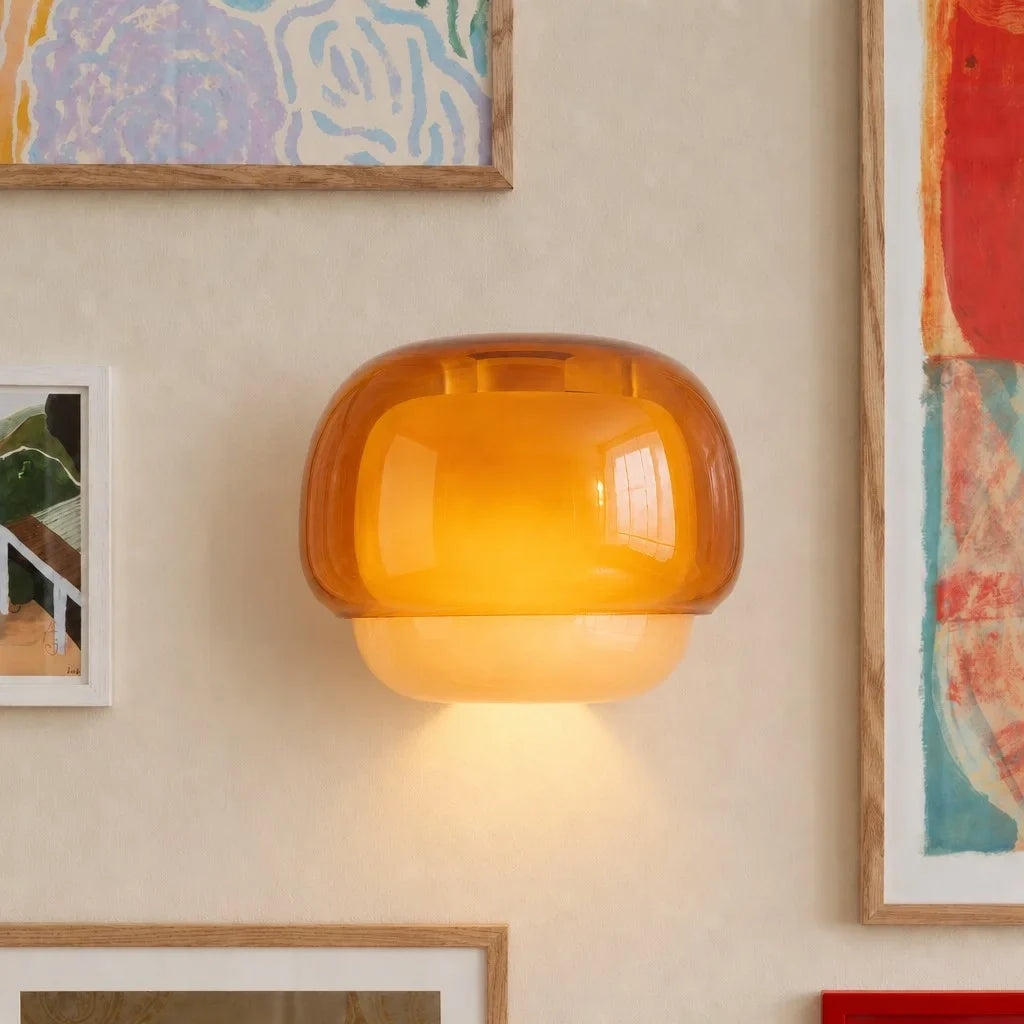 Coloured glass wall sconce viewed from a front angle unlit