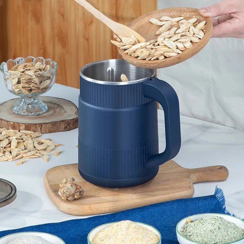 Compact food processor used for spices and grains on countertop