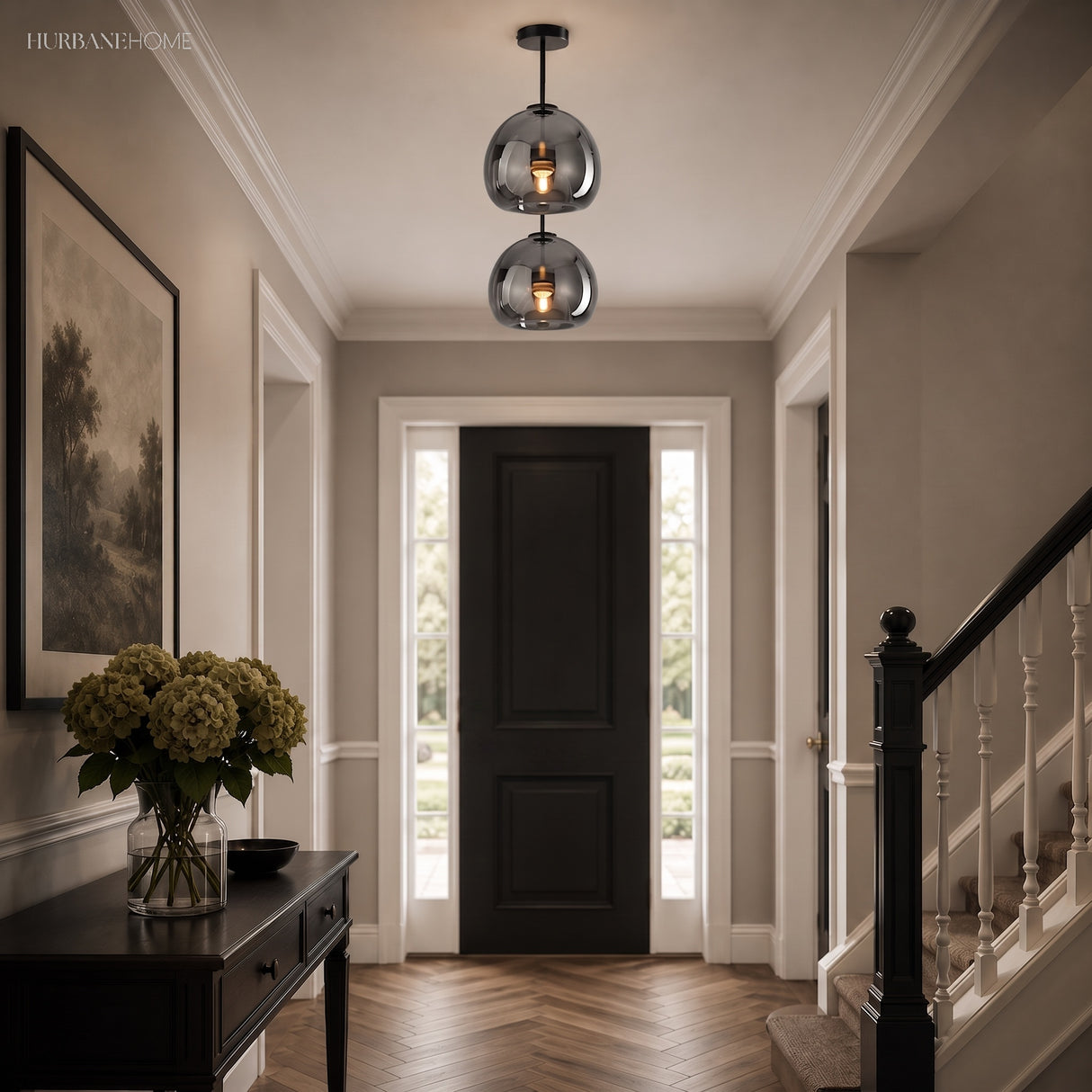 Two smoke glass semi flush lights in an entry hall beside a staircase