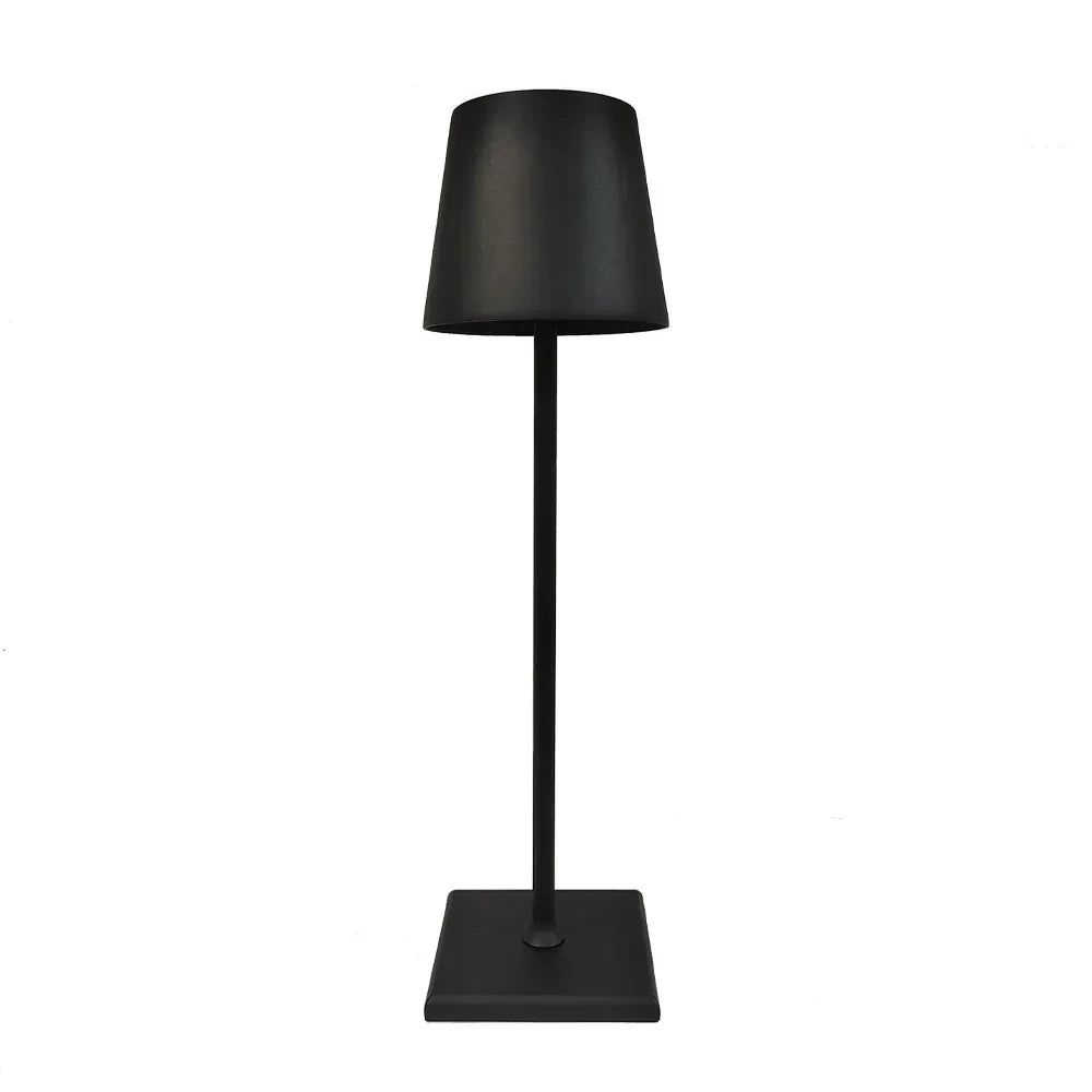 Black cordless table lamp with a tapered shade and slim stem