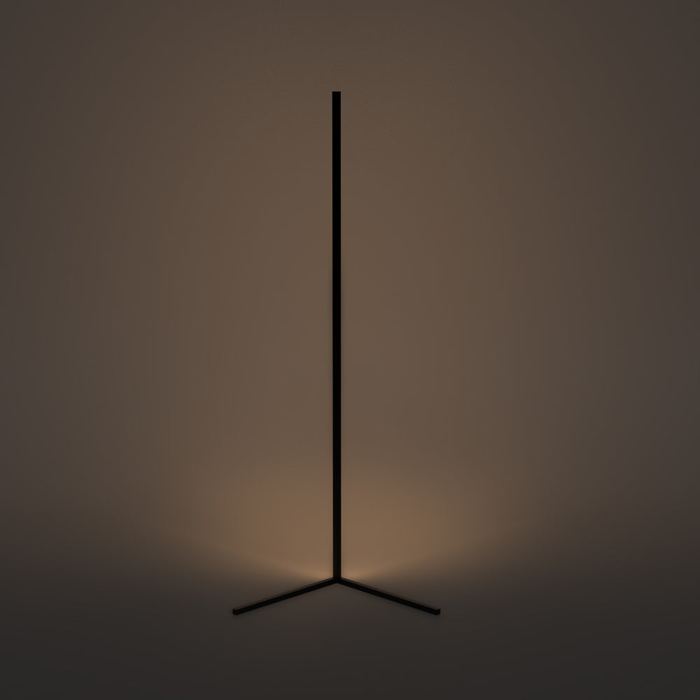 Close-up of the triangle corner base and lower body of the floor lamp