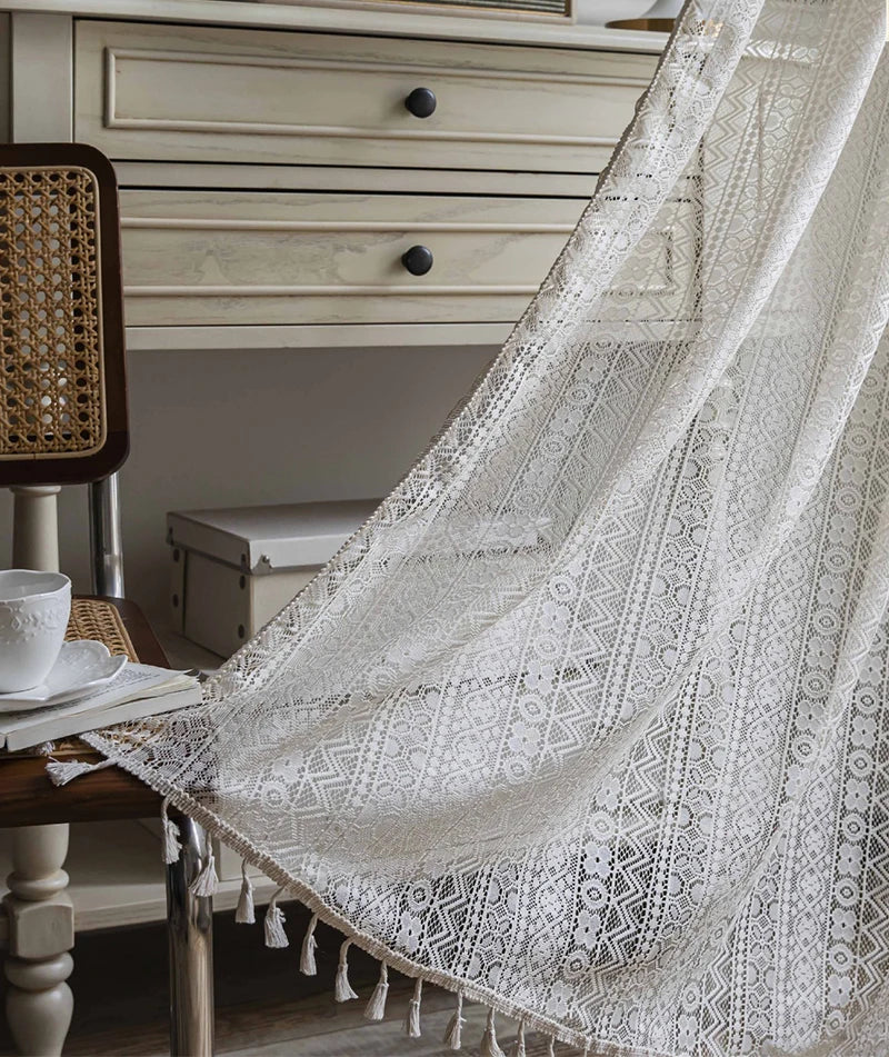 Cotton boho curtains layered with natural wood décor accents