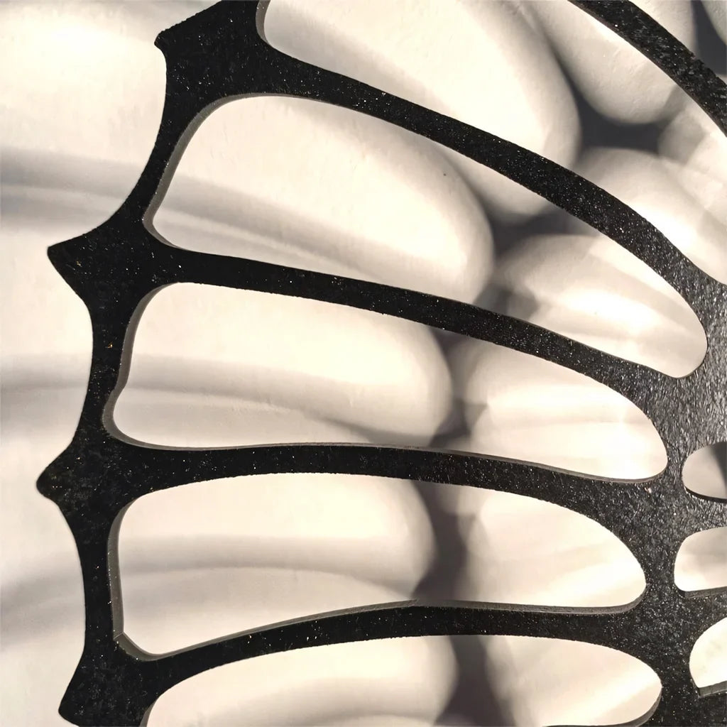 Detail of the shell wall light mount and finish