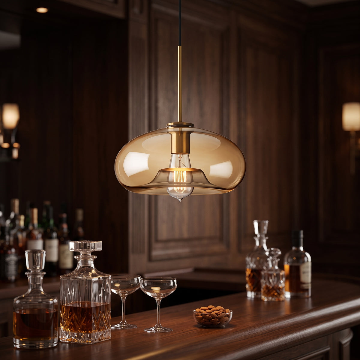 Amber glass pendant lighting a whisky bar counter in a paneled room