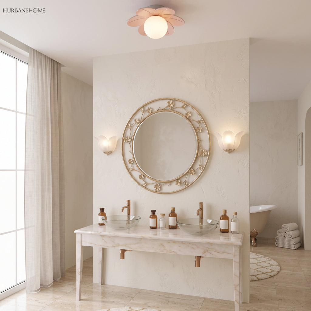 Pink petal flower ceiling light above a pale stone bathroom vanity and mirror