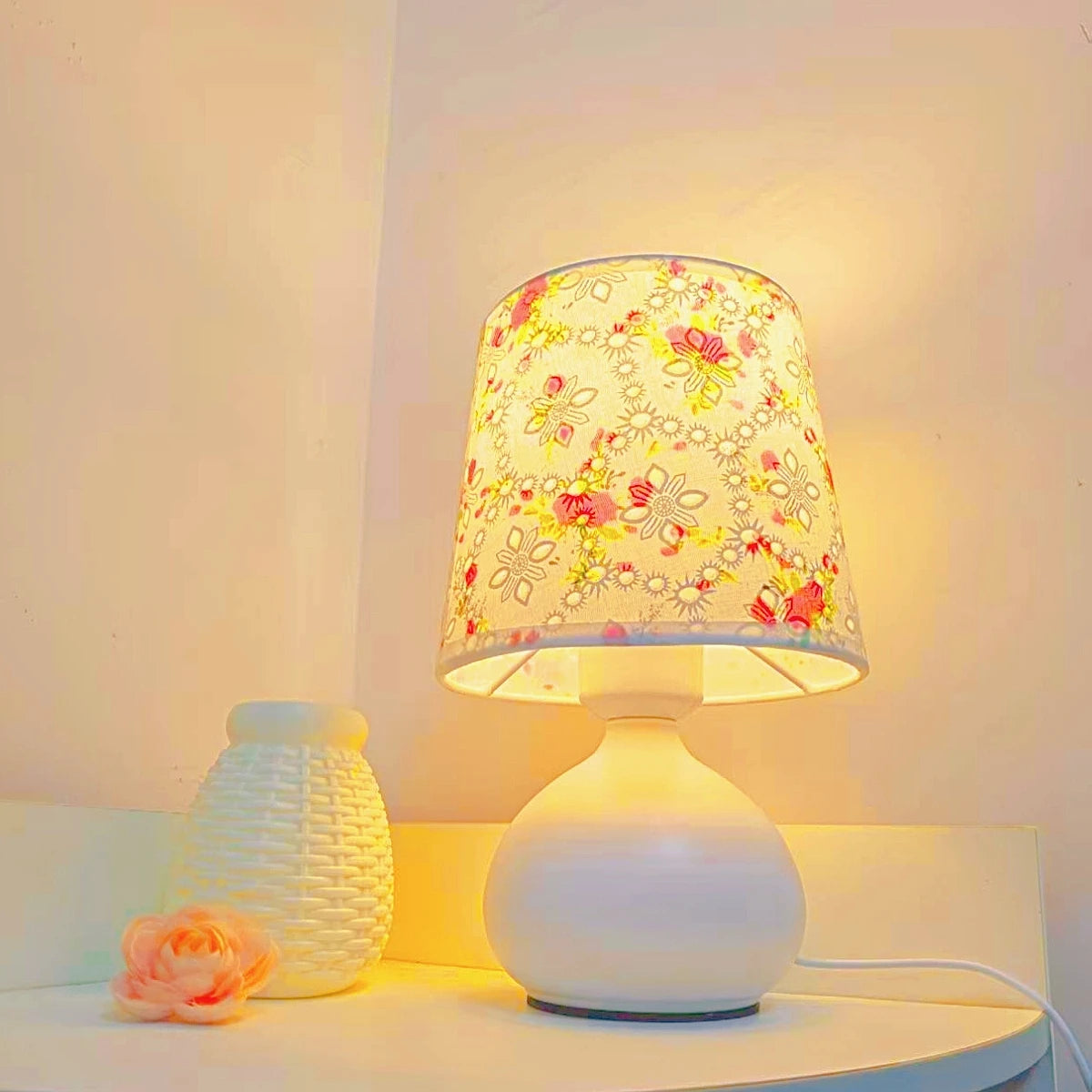 White floral table lamp with fabric shade for bedroom bedside lighting