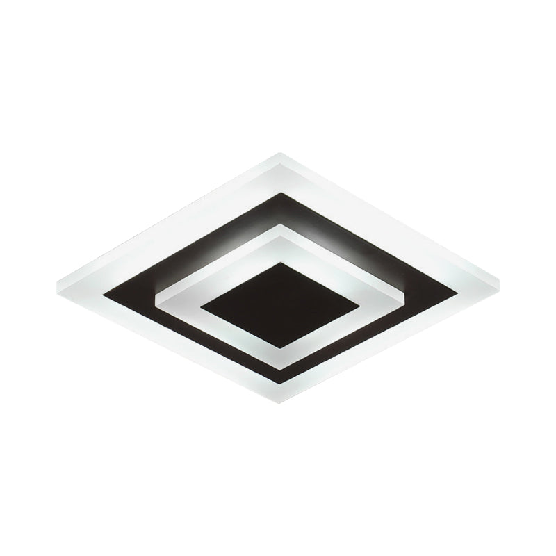 Square white plate with a coffee center seen from a low angle