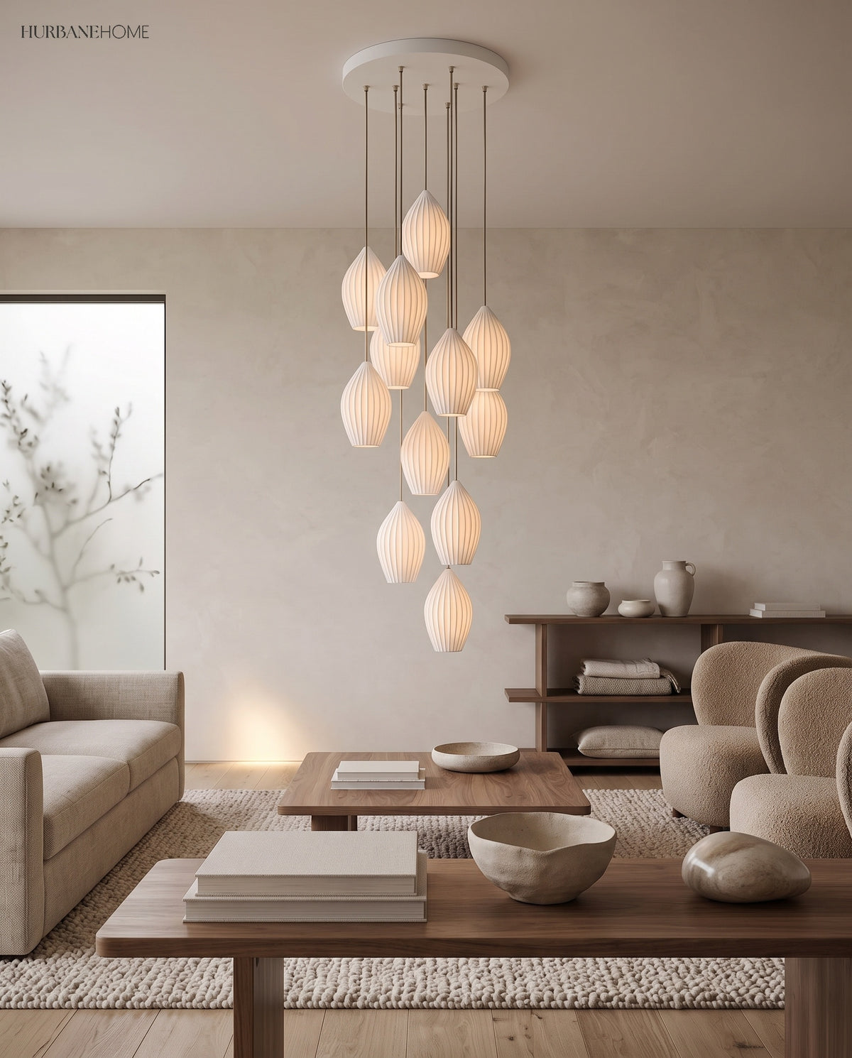 Cluster of fluted ceramic pendants at staggered heights in a lounge
