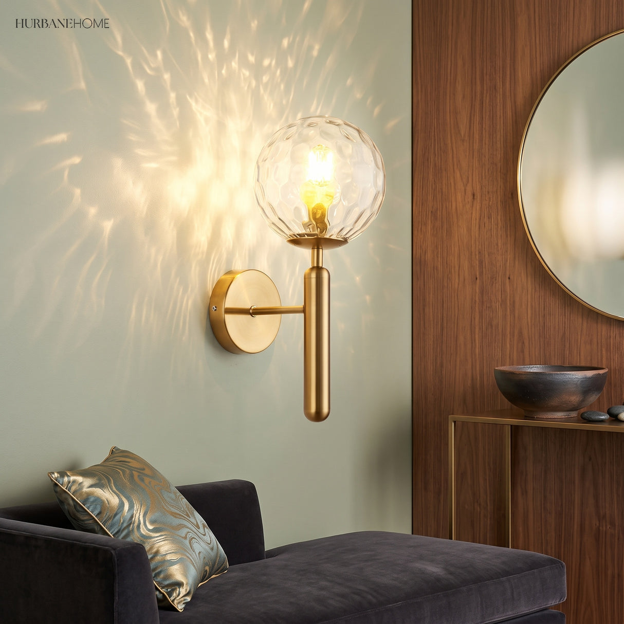 Ripple glass sconce casting a starburst light pattern above a sofa
