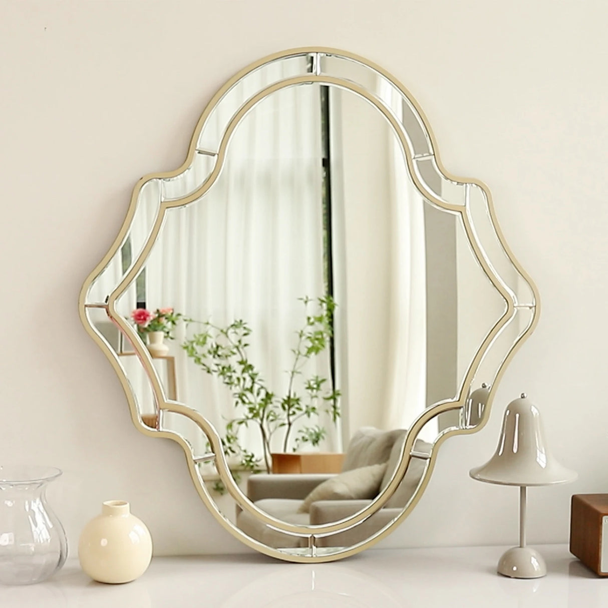Irregular shaped wall mirrors with gold rim