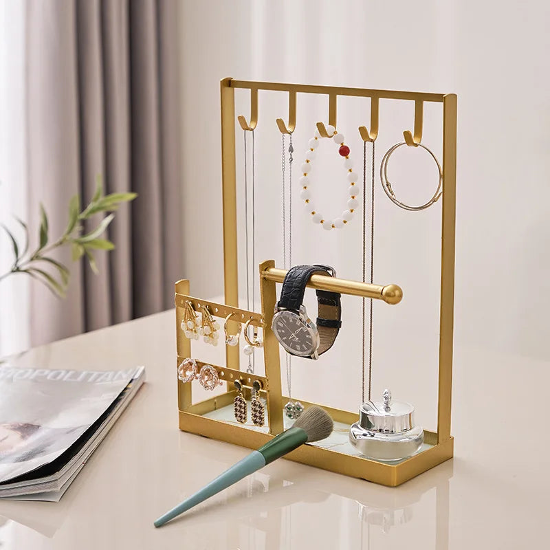 Gold Jewelry Display Rack Stand organizing earrings and bracelets neatly