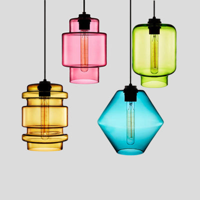 Four pendants in amber, pink, green and blue shown grouped together
