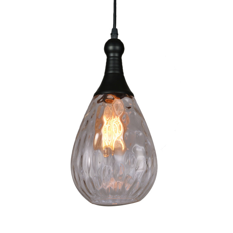 Black capped teardrop pendant with a clear dimpled glass shade