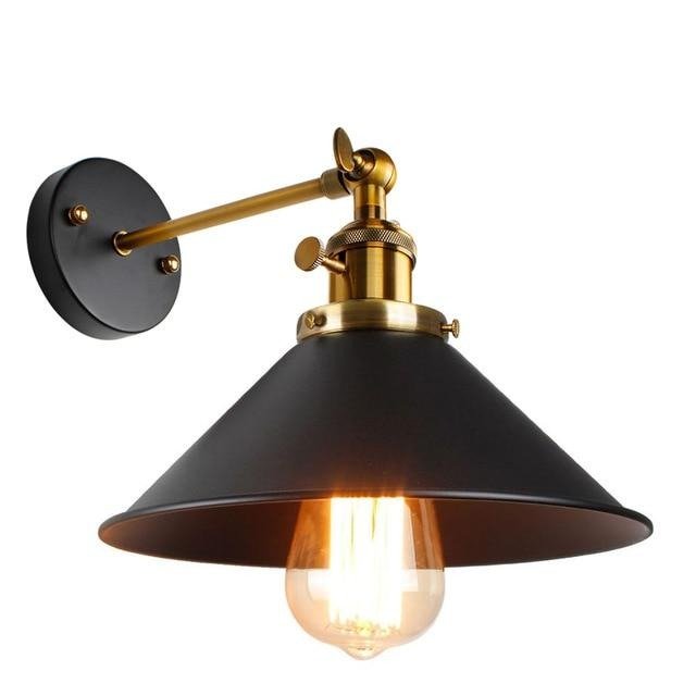 Black cone shade sconce with an aged bronze socket and thumbscrews