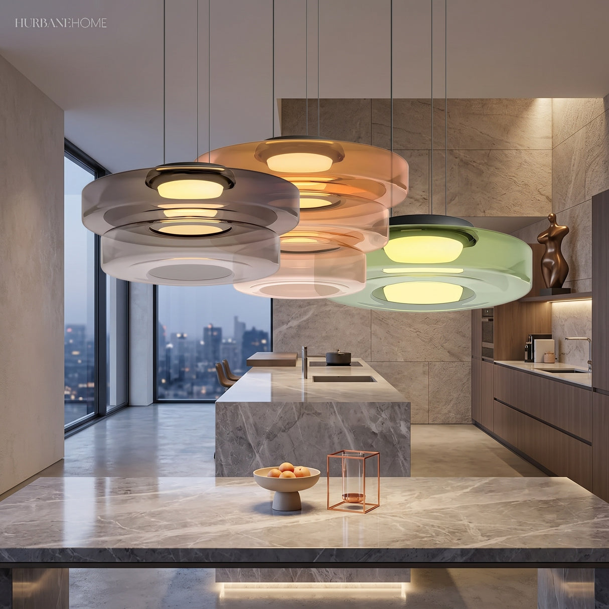 Cluster of tinted glass disc pendant lights over a kitchen island with city view