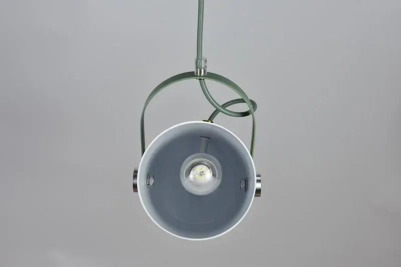 Underside view of a green pendant showing the lamp holder