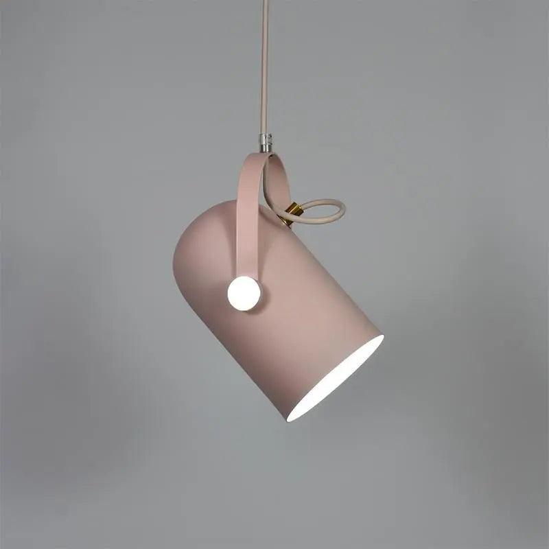 Pink pendant angled steeply showing its white inner shade