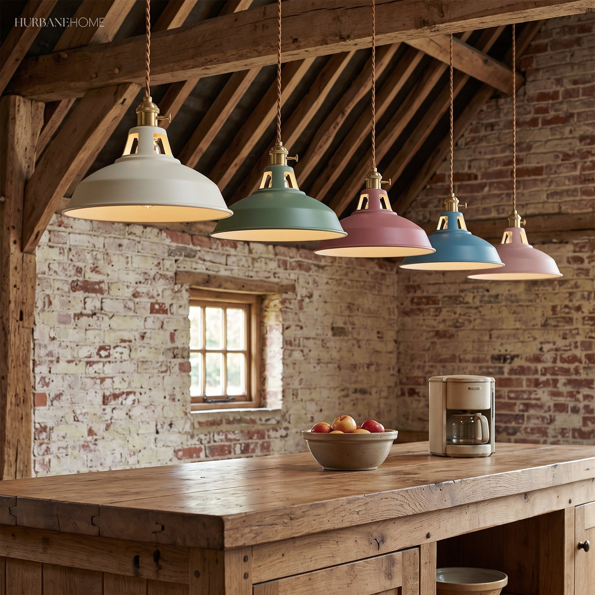 Five colored barn shade pendants hanging under exposed roof beams