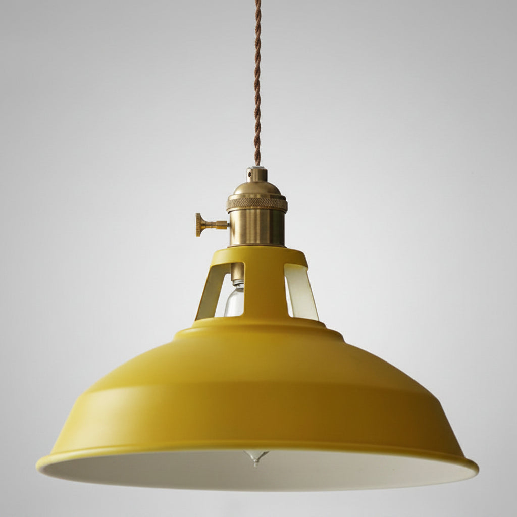 Angled studio view of the yellow barn shade and brass socket